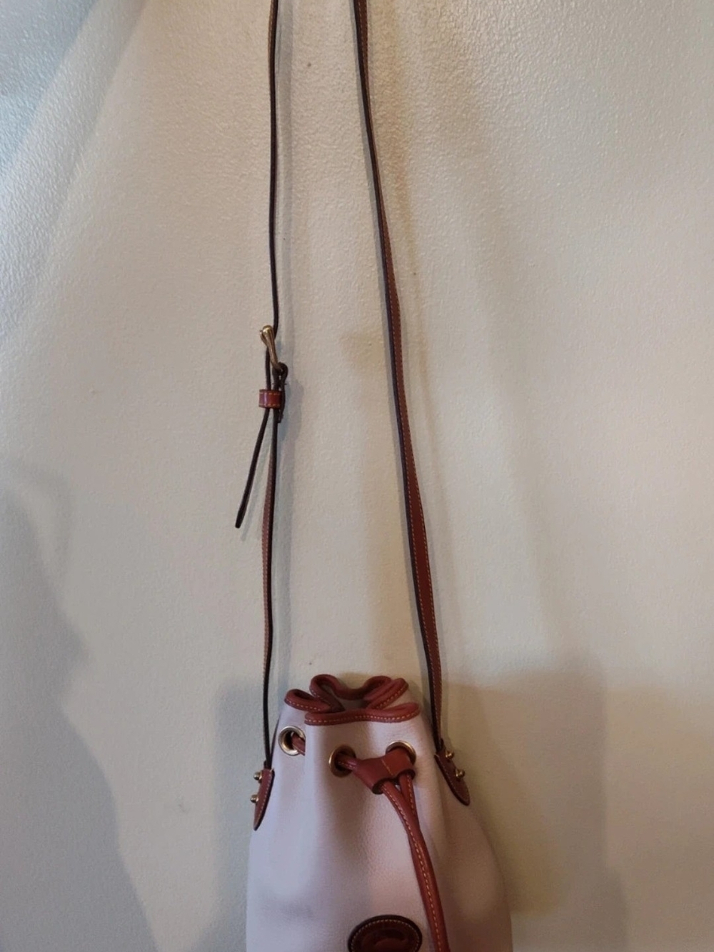 Dooney & Bourke White and Brown Leather Drawstring Bucket Bag - Picture 2 of 8